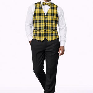 May include: A person in a yellow and black checked waistcoat, matching bow tie, white shirt, and black trousers. The waistcoat has a button-down front. The outfit is formal and suitable for special occasions.