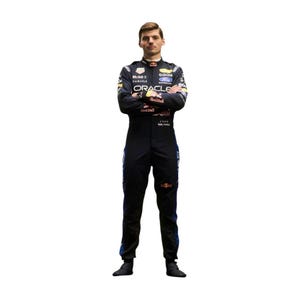 May include: A person wearing a black racing suit with sponsor logos, including "Oracle" and "Mobil 1". The suit has blue and red accents and the Red Bull logo. The person is standing with arms crossed.