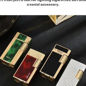May include: An assortment of gold-trimmed lighters in various colors, including green, red, black, and silver. Each lighter has a rectangular shape with a textured or patterned surface and the brand name "Derui" is visible on some. The image text says "Real Product Photo".