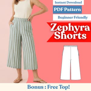 Może przedstawiać: Zielono-białe szorty culotte w paski z elastyczną talią. Obraz zawiera również wzór PDF na szorty, o nazwie "Zephyra Shorts" oraz tekst "Beginner Friendly". Tło jest różowe.