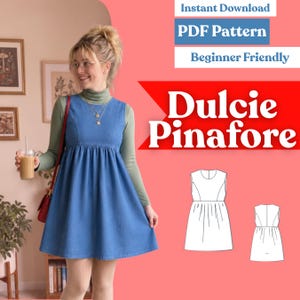 May include: A blue denim pinafore dress with a round neckline and a gathered skirt, worn over a sage green long-sleeve turtleneck. The image includes text reading Instant Download, PDF Pattern, Beginner Friendly, and Dulcie Pinafore.