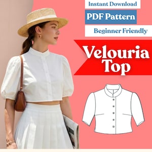 May include: A white button-down top with a mandarin collar and puff sleeves, paired with a white pleated skirt and a straw hat. The image includes text reading Instant Download, PDF Pattern, Beginner Friendly, and Velouria Top.