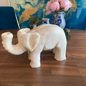 Solid white marble carved elephant