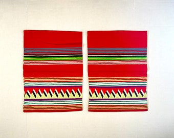 Pair of stitched South American table mats. Red with multicolor trim