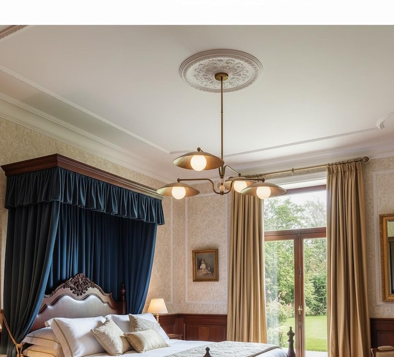 May include: A bedroom featuring a brass chandelier with four lights, each with a round, white bulb. The room has a dark blue canopy bed, beige curtains, and a decorative ceiling medallion.