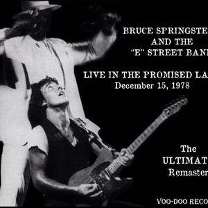 May include: Black and white image of Bruce Springsteen and the E Street Band. The image features Bruce Springsteen playing a guitar, with text that reads "Live in the Promised Land, December 15, 1978." The text "The Ultimate Remaster" is also visible.