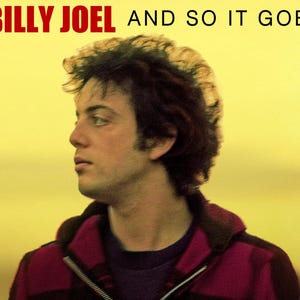 以下が含まれることがあります： ビリー・ジョエルのアルバムカバー。赤い文字で「BILLY JOEL」と曲名「AND SO IT GOES」が記されています。画像は、黄色い背景に、赤と黒のチェック柄のジャケットを着た男性が写っています。