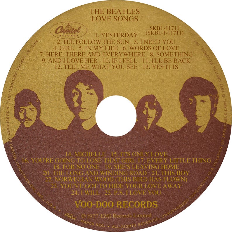 May include: A vintage vinyl record for "Love Songs" by The Beatles. The album cover is a sepia tone with the band's silhouettes and song titles. The Capitol Records logo is visible.
