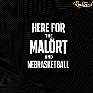 May include: Black graphic design with the text "HERE FOR THE MALÖRT AND NEBRASKETBALL" in bold white letters. The background has a wavy pattern and the RushTrend logo in the upper right corner.