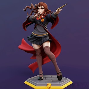 May include: A detailed figurine of a character from a fantasy series, wearing a school uniform with a red cape. The figure is posed with a wand, standing on a base with a crest. The color palette includes gray, black, red, and brown.
