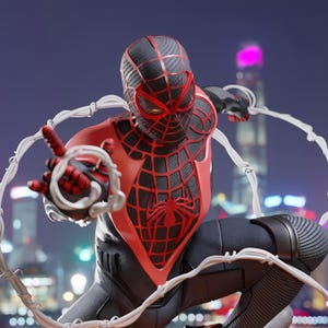 May include: A dynamic action figure of a superhero in a black and red suit, poised mid-action with web-like strands extending from the hands. The figure has a detailed design, with a spider emblem on the chest and a cityscape background.