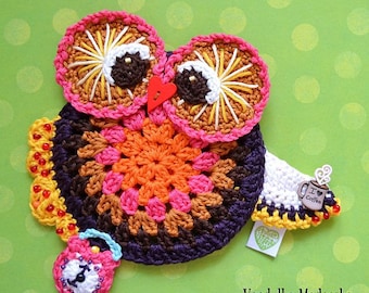May include: A crocheted owl with a colorful design, featuring a red heart, a clock, and a coffee cup with the text "I love coffee".
