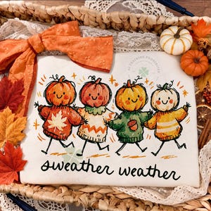 Sweater Weather PNG — four cute smiling pumpkin characters in cozy sweaters walking together, hand-drawn autumn pun design for fall sublimation shirts.