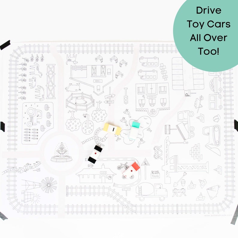May include: A black and white printable playmat with a town scene, including a farm, houses, a park, and a construction site. The text "Drive Toy Cars All Over Too!" is in a teal circle at the top right corner of the image.