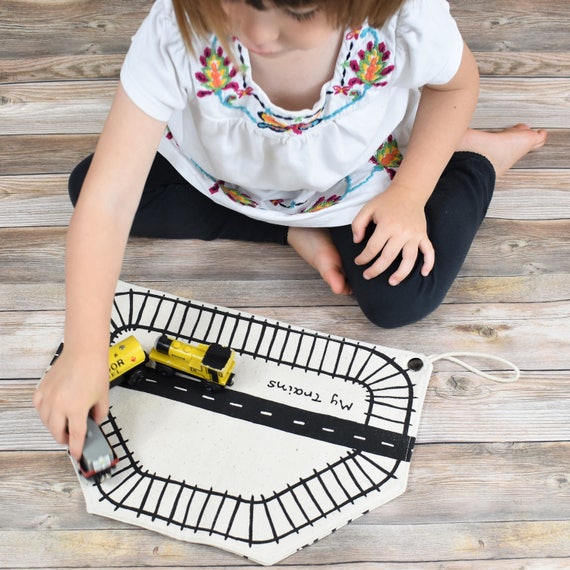 wooden train set in carry case