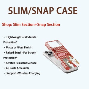 May include: A phone case with a red and white gingham pattern and a cartoon cat design. The case is labelled "SLIM/SNAP CASE" and features a lightweight design with a matte or gloss finish. It supports wireless charging.