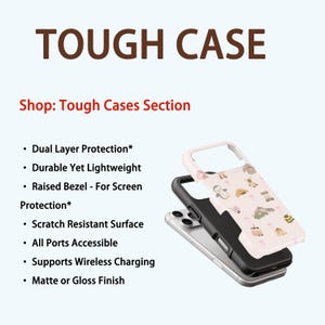 May include: A phone case with a black and white frame and a pink cover with cartoon illustrations. The text "TOUGH CASE" is at the top. Additional text includes "Dual Layer Protection", "Scratch Resistant Surface", and "Supports Wireless Charging".