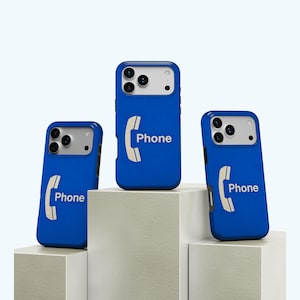 May include: Three blue phone cases with a white phone receiver graphic and the word "Phone". The cases are displayed on white geometric blocks. The cases have a camera cutout.