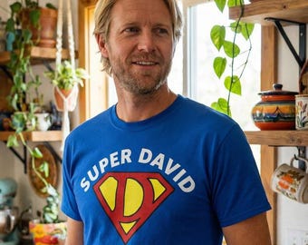 Camiseta personalizada con inicial y nombre de superhéroe, regalo de cómic para el superhéroe de tu vida.