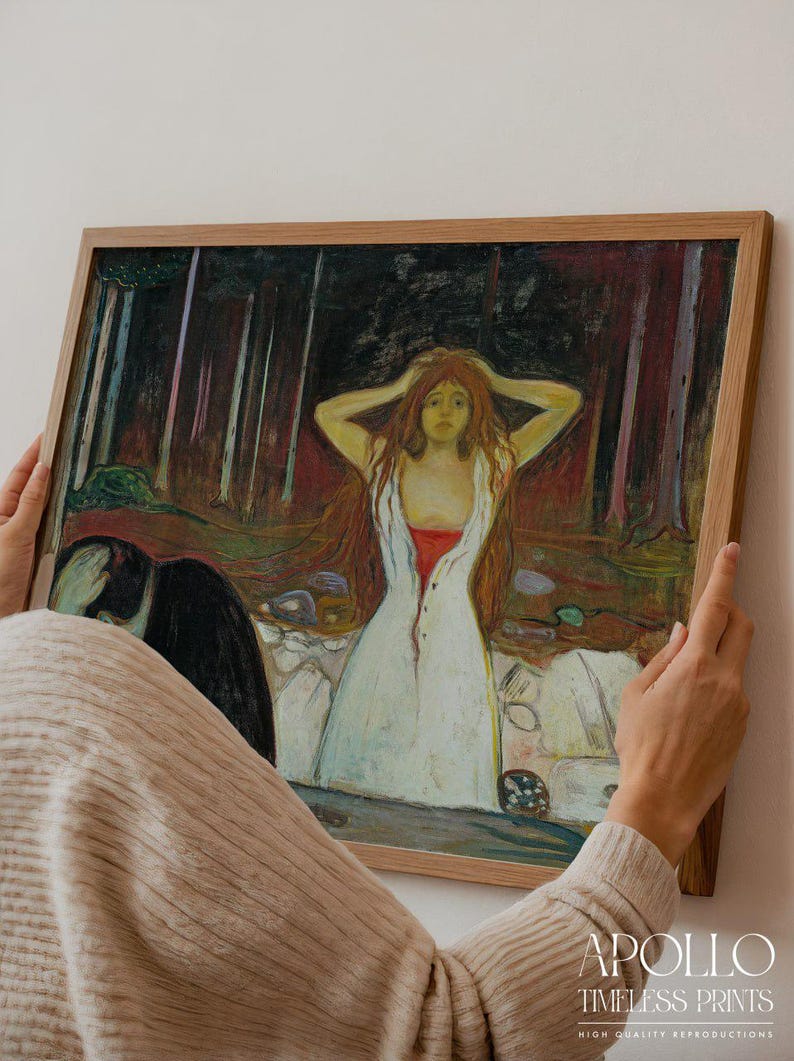 May include: A framed print of a painting featuring a woman in a white dress with red accents, set against a dark forest backdrop. The artwork has a vintage aesthetic, with the text "APOLLO TIMELESS PRINTS" at the bottom.