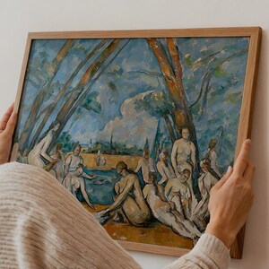 May include: A framed print of a classical painting depicting nude figures in a landscape with trees and water. The artwork features a palette of blues, greens, and browns, with the text "APOLLO TIMELESS PRINTS" at the bottom.