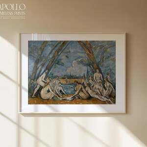 May include: Framed art print of a classical painting depicting nude figures near a body of water. The artwork features a blue sky, trees, and figures in various poses. The print is in a white frame and has the text "APOLLO TIMELESS PRINTS" in the upper left corner.