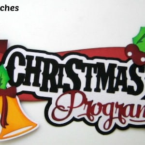 May include: Red and white banner with the text "Christmas Program" in black lettering. The banner is decorated with a musical note, two gold bells, and a red berry with green holly leaves.