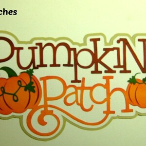 May include: A brown and orange paper craft with the words "Pumpkin Patch" and two pumpkins. The pumpkins are orange with green vines and leaves.