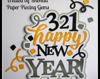 Página troquelada para álbum de recortes con el título "Feliz Año Nuevo" de Rhonda rm613art