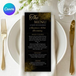 以下が含まれることがあります： 「The Menu」と「Amalia's 40th Birthday」と書かれた、金色のアクセントが付いた黒いメニューカード。メニューにはメインコース、デザート、飲み物が記載されています。カードは白いナプキン上に置かれ、金色のフォークとナイフが添えられています。