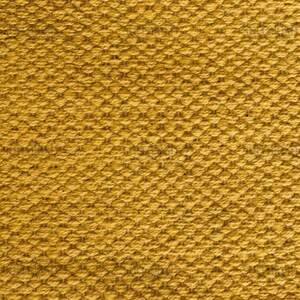 May include: Close-up of a textured fabric in a golden yellow color. The weave pattern is visible, creating a raised, grid-like texture. The fabric appears to be tightly woven, suggesting durability and a sturdy construction. The overall look is warm and inviting.