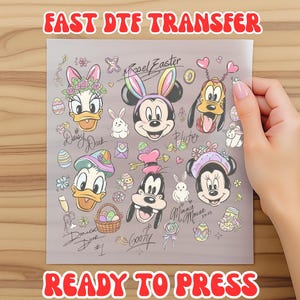 May include: A clear sheet featuring colorful cartoon character designs, including Mickey Mouse, Minnie Mouse, Donald Duck, and Goofy, with Easter-themed elements. The sheet has the text "FAST DTF TRANSFER" and "READY TO PRESS".