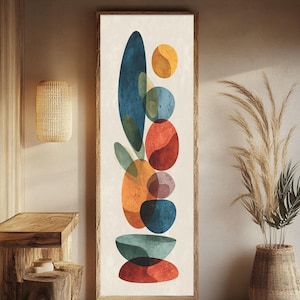 Puede incluir: Una pieza de arte mural alta y rectangular con marco que presenta una disposición vertical de formas abstractas superpuestas en tonos azul profundo, naranja brillante, amarillo cálido y rojo apagado sobre un fondo blanco roto texturizado.