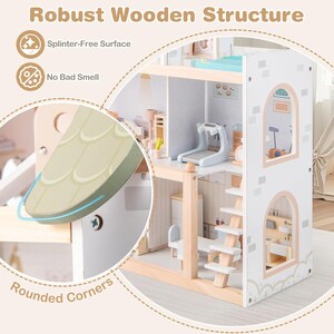 May include: A multi-story wooden dollhouse with a white exterior and light wood accents. The dollhouse features rounded corners, a splinter-free surface, and no bad smell. The interior includes miniature furniture and accessories, such as a treadmill and a ladder.