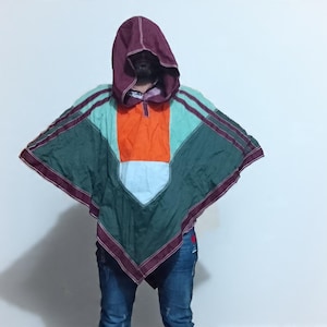 May include: A white ceramic mug with a black handle and the text "But First, Coffee" in a black, bold font. The mug is on a white surface. The mug is approximately 4 inches tall.