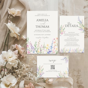 Könnte beinhalten: Hochzeitseinladungs-Set mit floralen Aquarelldesigns in Pastellfarben. Die Einladung enthält die Namen Amelia und Thomas, Datum, Uhrzeit und Ort. Das Set enthält eine RSVP-Karte und eine Detailkarte.
