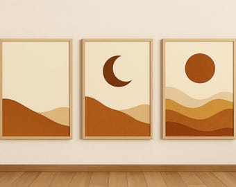 May include: A triptych of framed art prints with minimalist landscape designs. Each print has a beige background with brown and tan abstract shapes. One print features a crescent moon, another a sun, and the third is blank.