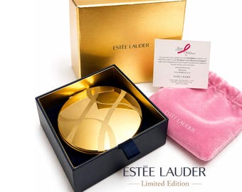 エスティ ローダー 2009 ゴールデン リボン ダブル ミラー コンパクト | ピンクリボン BCRF コレクション | ピンク ポーチ | コレクターズ バニティ ミラー、メイクアップなし