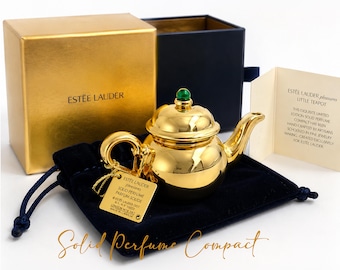 Perfume sólido compacto Estée Lauder Pleasures 2007 Little Teapot, edición vintage, raro, de lujo, color dorado, nuevo en caja, impecable.