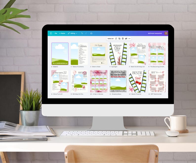 K&ouml;nnte beinhalten: Ein Computermonitor zeigt ein digitales Magazin-Layout mit verschiedenen Cover-Designs und Seitenlayouts. Das Magazin hat ein rosa und gr&uuml;nes Farbschema mit dem Titel "Birthday Magazine" oben. Der Bildschirm steht auf einem wei&szlig;en Schreibtisch mit einer Kaffeetasse und einer kleinen Pflanze.