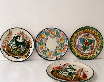 Set of Four Decorative Pottery Plates