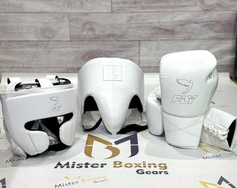 Equipo de boxeo con mosca, guantes de cuero blanco, casco y protector de ingle, equipo profesional