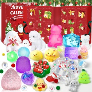 May include: A Christmas advent calendar box in red with numbered doors, featuring a collection of assorted squishy toys including a white rabbit, a white puppy, a pink bear, a green Christmas tree, various colorful spheres, and small animal figures.