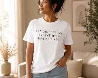 Ich bin mehr als alles, was mich braucht – Unisex-Baumwoll-T-Shirt für Damen