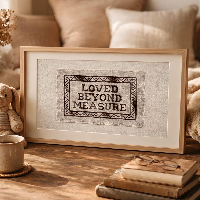 May include: A white ceramic mug with a black handle and the text "But First, Coffee" in a bold, black font. The mug is set against a blurred background, highlighting its clean design.