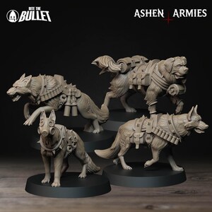 May include: Four detailed, gray-colored dog figurines, each posed differently. The dogs are equipped with tactical gear, including backpacks, harnesses, and gas masks. The text "Bite the Bullet" and "Ashen Armies" are visible.