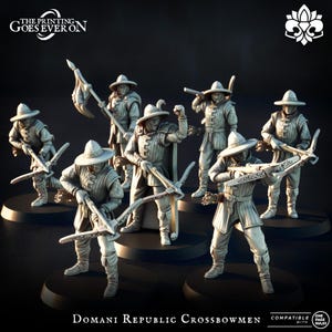 May include: A collection of miniature figures of Domani Republic Crossbowmen. The figures are dressed in period clothing, holding crossbows, and wearing hats. The figures are in a variety of poses, some with weapons raised. The text "The Printing Goes Ever On" is at the top.