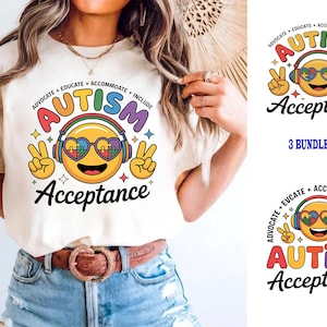 Puede incluir: Una camiseta color crema con un diseño gráfico colorido. El diseño incluye la palabra "AUTISMO" en colores del arcoíris, un emoji sonriente con auriculares y gafas en forma de corazón, y la palabra "Aceptación". El diseño también incluye las frases "Advocate + Educate + Accommodate + Include".