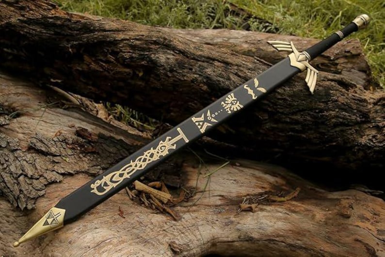 May include: A black sword with gold detailing, featuring ornate patterns and a decorative hilt. The blade rests on a weathered log, highlighting the details of the fantasy weapon. The sword's design includes a gold emblem on the blade.