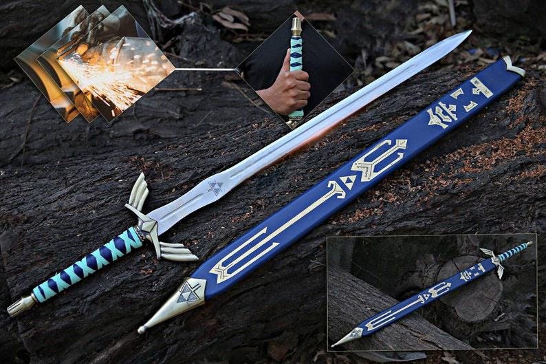May include: A fantasy sword with a silver blade and a blue and turquoise handle. The matching blue sheath has silver detailing. The image shows the sword and sheath on a dark wooden surface, with close-up images of the sword's construction.